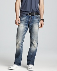 Heavily washed with distressing at the legs, this cool pair of jeans features contrast fading details for an authentic, tried-and-true design you can count on. Heavily washed with distressing at the legs, this cool pair of jeans features contrast fading details for an authentic, tried-and-true design you can count on.