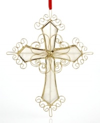 A traditional symbol of the season, this cross ornament gives a sweet shine to your tree with a lustrous Capiz shell base and gold frame. With red ribbon handing thread. A traditional symbol of the season, this cross ornament gives a sweet shine to your tree with a lustrous Capiz shell base and gold frame. With red ribbon handing thread.