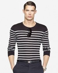 Tailored in a trim-fitting silhouette, a striped long-sleeved crewneck tee embodies effortless style in fine-ribbed, mercerized cotton. Tailored in a trim-fitting silhouette, a striped long-sleeved crewneck tee embodies effortless style in fine-ribbed, mercerized cotton.