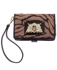 Give your gadget an exotic edge with this tiger-print tech case from Juicy Couture. Safely stows iPhone, headphones and credit cards, while the convenient wristlet strap lets you carry it all off with purr-fection. Give your gadget an exotic edge with this tiger-print tech case from Juicy Couture. Safely stows iPhone, headphones and credit cards, while the convenient wristlet strap lets you carry it all off with purr-fection.