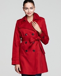 This take on the timeless double-breasted belted trench coat features a vibrant red hue and glossy black buttons to brighten up your look on even the rainiest day. This take on the timeless double-breasted belted trench coat features a vibrant red hue and glossy black buttons to brighten up your look on even the rainiest day.