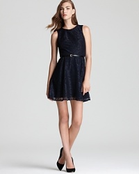 Floral lace takes on a sophisticated look with this sleeveless Ali Ro dress, accessorized with a matching, detachable belt. Floral lace takes on a sophisticated look with this sleeveless Ali Ro dress, accessorized with a matching, detachable belt.