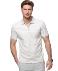 This polo shirt from Calvin Klein elevates your casual look with a luxurious feel. This polo shirt from Calvin Klein elevates your casual look with a luxurious feel.