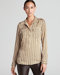 A subtle chain-link print lends luxe inspiration to a MICHAEL Michael Kors Petites shirt for a glamorous 9-to-5 option. A subtle chain-link print lends luxe inspiration to a MICHAEL Michael Kors Petites shirt for a glamorous 9-to-5 option.