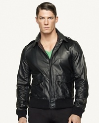 Evoking the feel of the timeless military staple, this fresh interpretation features a rich Italian leather construction, tailored for a trim fit with spacious patch pockets at the hips. Evoking the feel of the timeless military staple, this fresh interpretation features a rich Italian leather construction, tailored for a trim fit with spacious patch pockets at the hips.