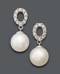 Polished drops in chic shapes. Belle de Mer earrings highlight cultured freshwater pearls (9-10 mm) suspended from oval-shaped cut-out posts decorated with sparkling round-cut diamonds (3/8 ct. t.w.). Setting crafted in 14k white gold. Approximate drop: 3/4 inch. Polished drops in chic shapes. Belle de Mer earrings highlight cultured freshwater pearls (9-10 mm) suspended from oval-shaped cut-out posts decorated with sparkling round-cut diamonds (3/8 ct. t.w.). Setting crafted in 14k white gold. Approximate drop: 3/4 inch.