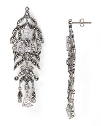 Wear this pair of Judith Jack party lights for elegant sparkle, crafted of sterling silver with a delicate cascade of crystal accents. Wear this pair of Judith Jack party lights for elegant sparkle, crafted of sterling silver with a delicate cascade of crystal accents.
