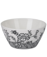 Oleg Cassini weaves a table of playful sophistication with the Ava fruit bowl, featuring lacy flowers and dots in timeless black and white. Oleg Cassini weaves a table of playful sophistication with the Ava fruit bowl, featuring lacy flowers and dots in timeless black and white.