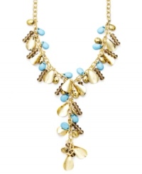 Brighten your look with bold style and a hint of summer color. INC International Concepts' Y-shaped necklace features plastic turquoise beads, oxidized brass tone accents and glass rondelles. Set in mixed metal. Approximate length: 21 inches. Approximate drop: 5 inches.