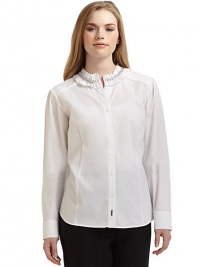 THE LOOKRuffled collar with chain detailButtonfrontButtoned cuffsLogo hardware at placket bottomShirttail hemTHE FITAbout 26 from shoulder to hemTHE MATERIAL76% cotton/21% nylon/3% elastaneCARE & ORIGINMachine washImported THE LOOKRuffled collar with chain detailButtonfrontButtoned cuffsLogo hardware at placket bottomShirttail hemTHE FITAbout 26 from shoulder to hemTHE MATERIAL76% cotton/21% nylon/3% elastaneCARE & ORIGINMachine washImported