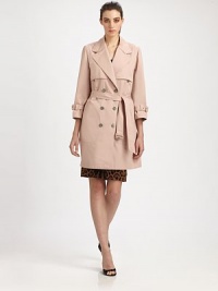 Crisp cotton, tailored in a classic, double-breasted style and finished with belted cuffs.Notched lapelsDouble-breasted button frontThree-quarter sleeves with belted cuffsSelf beltSide slash pocketsFront and back rainflapFully linedAbout 36 from shoulder to hemCottonDry cleanMade in Italy of imported fabricModel shown is 5'11 (180cm) wearing US size 4.OUR FIT MODEL RECOMMENDS ordering true size. Crisp cotton, tailored in a classic, double-breasted style and finished with belted cuffs.Notched lapelsDouble-breasted button frontThree-quarter sleeves with belted cuffsSelf beltSide slash pocketsFront and back rainflapFully linedAbout 36 from shoulder to hemCottonDry cleanMade in Italy of imported fabricModel shown is 5'11 (180cm) wearing US size 4.OUR FIT MODEL RECOMMENDS ordering true size.