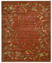 Exquisitely chic with an alluring vine and leaf motif, this area rug is hand tufted and hand carved from only the finest premium wool. Set against a persimmon-hued ground, it's expertly washed to lend the surface a handsome luster, texture and sheen. Exquisitely chic with an alluring vine and leaf motif, this area rug is hand tufted and hand carved from only the finest premium wool. Set against a persimmon-hued ground, it's expertly washed to lend the surface a handsome luster, texture and sheen.