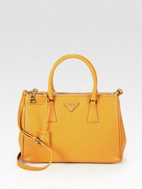 Timeless silhouette in rich, stamped leather has two exposed metal zipper compartments with an open section. Double top handles, 4 Three compartments: two zipper closures, one open Metal feet Inside zipper pocket Signature jacquard lining 11½W X 8¼H X 5D Made in Italy Timeless silhouette in rich, stamped leather has two exposed metal zipper compartments with an open section. Double top handles, 4 Three compartments: two zipper closures, one open Metal feet Inside zipper pocket Signature jacquard lining 11½W X 8¼H X 5D Made in Italy