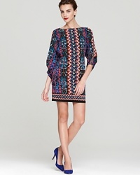 This Laundry by Shelli Segal jersey dress lends a bold look in a vibrant, multicolor print. This Laundry by Shelli Segal jersey dress lends a bold look in a vibrant, multicolor print.