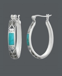 Make a splash this summer in vivid style. Genevieve & Grace adds glamour to the traditional hoop earring with a simulated turquoise accent (8 mm x 4 mm) and glittering marcasite. Set in sterling silver. Approximate diameter: 5/8 inch. Make a splash this summer in vivid style. Genevieve & Grace adds glamour to the traditional hoop earring with a simulated turquoise accent (8 mm x 4 mm) and glittering marcasite. Set in sterling silver. Approximate diameter: 5/8 inch.