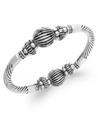 Stylishly stunning, this stretch bracelet from Charter Club is crafted from silver-tone mixed metal. Silver-tone beads raise the bar on fashion. Approximate diameter: 2-1/2 inches. Stylishly stunning, this stretch bracelet from Charter Club is crafted from silver-tone mixed metal. Silver-tone beads raise the bar on fashion. Approximate diameter: 2-1/2 inches.