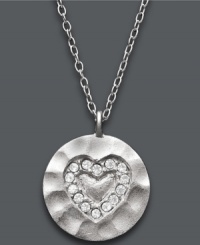 Say it from the heart. Studio Silver's darling pendant features a textured sterling silver setting and sparkling, round-cut crystals in a romantic heart shape. Approximate length: 16 inches + 2-1/2 inch-extender. Approximate drop: 3/4 inch.