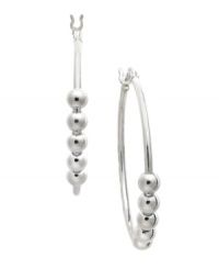 A must-have piece for every girl's collection. Giani Bernini's delicate hoop earrings feature a unique, 5-bead design in sterling silver. Approximate diameter: 30 mm. A must-have piece for every girl's collection. Giani Bernini's delicate hoop earrings feature a unique, 5-bead design in sterling silver. Approximate diameter: 30 mm.