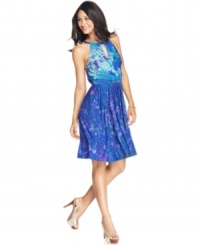 Suzi Chin's swingy jersey dress is emboldened with a paint-splatter print and flirty keyholes at the front and back. Suzi Chin's swingy jersey dress is emboldened with a paint-splatter print and flirty keyholes at the front and back.