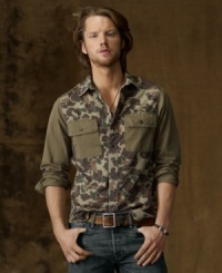 Channeling a spirit of adventure and a hip downtown vibe, this cotton twill shirt goes the rugged route with a retro camo print. Channeling a spirit of adventure and a hip downtown vibe, this cotton twill shirt goes the rugged route with a retro camo print.