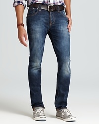 Perfectly weathered for a comfy, lived-in look and feel, the Grim Tim jean breaks the barrier between casual and cool.