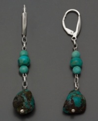 Smooth, peaceful turquoise adds appeal to any look. Earrings in off-shape baroque turquoise with sterling silver. Approximate drop: 2-1/4 inches. Smooth, peaceful turquoise adds appeal to any look. Earrings in off-shape baroque turquoise with sterling silver. Approximate drop: 2-1/4 inches.