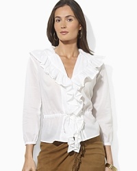 Delicate gathering and a breezy woven cotton construction lend feminine inspiration to a soft blouse. Delicate gathering and a breezy woven cotton construction lend feminine inspiration to a soft blouse.