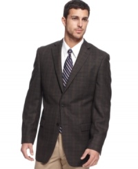 Shake up your rotation from the usual blacks and blues. This Calvin Klein brown plaid blazer is the changeup you've been needing. Shake up your rotation from the usual blacks and blues. This Calvin Klein brown plaid blazer is the changeup you've been needing.