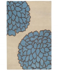 In full bloom. This artist-designed area rug from Surya features whimsical florals set in a palette of deep, rich colors. Hand-tufted from exceptionally soft New Zealand wool, the brilliant use of high and low pile adds texture and dimension. In full bloom. This artist-designed area rug from Surya features whimsical florals set in a palette of deep, rich colors. Hand-tufted from exceptionally soft New Zealand wool, the brilliant use of high and low pile adds texture and dimension.
