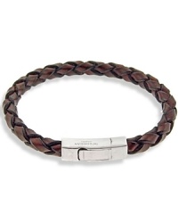 A handsome accessory from Tateossian combines woven leather with a robust sterling silver clasp for classic, masculine appeal. A handsome accessory from Tateossian combines woven leather with a robust sterling silver clasp for classic, masculine appeal.