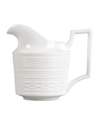 Full of history, the Intaglio creamer from Wedgwood features modern bone china embossed with geometric motifs from the Georgian era. With a distinct handle design. Full of history, the Intaglio creamer from Wedgwood features modern bone china embossed with geometric motifs from the Georgian era. With a distinct handle design.