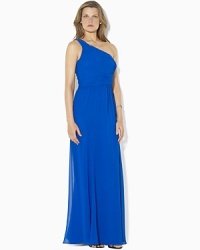 Stunning one-shoulder gown is tailored from luxurious, light-as-air georgette for graceful movement and glamorous style. Stunning one-shoulder gown is tailored from luxurious, light-as-air georgette for graceful movement and glamorous style.