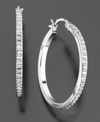 A fabulous find that's always in fashion. These beautiful sterling silver hoop earrings feature round-cut diamond accents. Approximate diameter: 1 inch. A fabulous find that's always in fashion. These beautiful sterling silver hoop earrings feature round-cut diamond accents. Approximate diameter: 1 inch.
