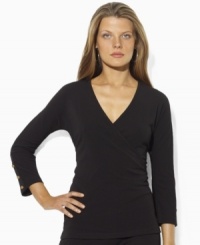 Lauren by Ralph Lauren's slinky matte jersey creates a figure-flattering faux-wrap design, tailored with three-quarter sleeves and anchor-embossed buttons for a hint of seaside chic. Lauren by Ralph Lauren's slinky matte jersey creates a figure-flattering faux-wrap design, tailored with three-quarter sleeves and anchor-embossed buttons for a hint of seaside chic.