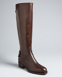 These sleekly shaped Joan & David riding boots are accented with snapped back buckles that give the style extra dash. These sleekly shaped Joan & David riding boots are accented with snapped back buckles that give the style extra dash.