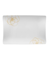 A modern canvas for everyday meals, the large Bloom Sun rectangular plates have a smooth, flat surface that's artfully scribbled with golden florals for a look that's fresh--and in durable porcelain--not fussy. From Villeroy & Boch. A modern canvas for everyday meals, the large Bloom Sun rectangular plates have a smooth, flat surface that's artfully scribbled with golden florals for a look that's fresh--and in durable porcelain--not fussy. From Villeroy & Boch.