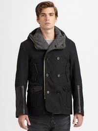Hooded, convertible 3-in-1 double-breasted style is lined with a removable vest and accented with luxurious leather trim at the sleeves and pockets.Zip frontAttached hoodChest, waist flap pocketsAbout 28 from shoulder to hemCottonDry cleanImported Hooded, convertible 3-in-1 double-breasted style is lined with a removable vest and accented with luxurious leather trim at the sleeves and pockets.Zip frontAttached hoodChest, waist flap pocketsAbout 28 from shoulder to hemCottonDry cleanImported