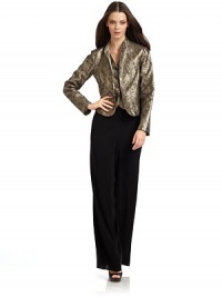 THE LOOKMetallic sheen with etched textureV necklineLayered-look vest panelButton frontLong sleevesTHE FITAbout 18½ from shoulder to longest point of hemTHE MATERIALLambskinSilk liningCARE & ORIGINDry clean by leather specialistMade in Italy THE LOOKMetallic sheen with etched textureV necklineLayered-look vest panelButton frontLong sleevesTHE FITAbout 18½ from shoulder to longest point of hemTHE MATERIALLambskinSilk liningCARE & ORIGINDry clean by leather specialistMade in Italy