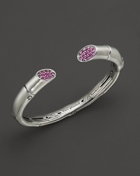 John Hardy's iconic sterling silver Bamboo cuff, detailed with faceted pink sapphires. John Hardy's iconic sterling silver Bamboo cuff, detailed with faceted pink sapphires.