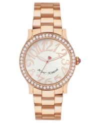 Fashion you can count on. This Betsey Johnson watch features crystal accents and large numerals at the dial. Fashion you can count on. This Betsey Johnson watch features crystal accents and large numerals at the dial.