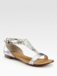 A textured snake-print pairs perfectly with lustrous metallic leather in this classic silhouette. Snake-print leather and metallic leather upperAdjustable ankle strapLeather lining and solePadded insoleImported A textured snake-print pairs perfectly with lustrous metallic leather in this classic silhouette. Snake-print leather and metallic leather upperAdjustable ankle strapLeather lining and solePadded insoleImported