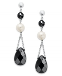 Ebony and ivory. Cultured freshwater pearls (6-1/2-7 mm) and faceted onyx (9 mm x 13 mm and 5 mm) create an elegant look on these dangling sterling silver earrings. Approximate drop: 1-3/4 inches.