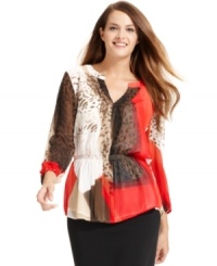 Calvin Klein mixes an animal print in neutral tones with a bright pop of color and a pleated front placket for vibrant look. Calvin Klein mixes an animal print in neutral tones with a bright pop of color and a pleated front placket for vibrant look.
