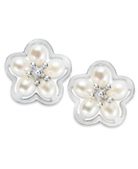 Sophistication meets spring. These petite flower stud earrings are decorated with cultured freshwater pearls (4-4-1/2 mm) at the petals and a gleaming sterling silver setting. Approximate diameter: 1/2 inch. Sophistication meets spring. These petite flower stud earrings are decorated with cultured freshwater pearls (4-4-1/2 mm) at the petals and a gleaming sterling silver setting. Approximate diameter: 1/2 inch.