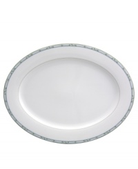 Inspire calm around the table with the effortless grace of Perennial Green serveware and serving dishes from Nikko. Green vines wind across swaths of pale blue on an oval platter and vegetable bowl that are as durable as they are stylish. Inspire calm around the table with the effortless grace of Perennial Green serveware and serving dishes from Nikko. Green vines wind across swaths of pale blue on an oval platter and vegetable bowl that are as durable as they are stylish.
