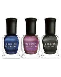 Magnet Appeal is a set of three mini magnetic lacquers, including Magic Man (a midnight navy wave), Punk Princess (a gilded raspberry wave) and Hard Knock Life (a gunmetal black wave). The set also includes a custom-designed magnet to create the unique wave design.The trio offers the perfect punch of color for fall-bold but not too bright-with different shades to suit your mood. The designs are endless so you can let your creativity soar, and similar to using glitter lacquer, the beauty is in the imperfection. Each nail shouldn't look the same, and if you don't like a design, just apply another coat of polish and try again. There's nothing easier than holding a magnet over the nail and unleashing your inner artist.What's Deborah Lippmann's technique? As usual, begin with a base coat and then apply one coat of the magnet lacquer-be sure to wait a full minute or two between layers to let solvents dry. When applying the second coat to create a design, Deborah likes to paint one nail at a time and immediately hover the magnet above the nail while the lacquer is very wet to achieve the best design effects. Create different wave designs by moving the magnet in different directions. Personalize your nail art and have fun with it! Magnet Appeal is a set of three mini magnetic lacquers, including Magic Man (a midnight navy wave), Punk Princess (a gilded raspberry wave) and Hard Knock Life (a gunmetal black wave). The set also includes a custom-designed magnet to create the unique wave design.The trio offers the perfect punch of color for fall-bold but not too bright-with different shades to suit your mood. The designs are endless so you can let your creativity soar, and similar to using glitter lacquer, the beauty is in the imperfection. Each nail shouldn't look the same, and if you don't like a design, just apply another coat of polish and try again. There's nothing easier than holding a magnet over the nail and unleashing your inner artist.What's Deborah Lippmann's technique? As usual, begin with a base coat and then apply one coat of the magnet lacquer-be sure to wait a full minute or two between layers to let solvents dry. When applying the second coat to create a design, Deborah likes to paint one nail at a time and immediately hover the magnet above the nail while the lacquer is very wet to achieve the best design effects. Create different wave designs by moving the magnet in different directions. Personalize your nail art and have fun with it!