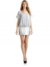THE LOOKScoop necklineChiffon overlaySequin chest patch pocketShort sleeves with sequin cuffsDropped waist with wide sequin-embellished hemTonal underlayTHE FITAbout 32 from shoulder to hemTHE MATERIALPolyesterFully linedCARE & ORIGINHand washImportedModel shown is 5'11 (180cm) wearing US size 4. THE LOOKScoop necklineChiffon overlaySequin chest patch pocketShort sleeves with sequin cuffsDropped waist with wide sequin-embellished hemTonal underlayTHE FITAbout 32 from shoulder to hemTHE MATERIALPolyesterFully linedCARE & ORIGINHand washImportedModel shown is 5'11 (180cm) wearing US size 4.