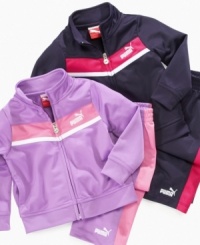 Track star style. Keep her warmed up when she's on the go in this cute, cozy look from Puma, with matching jacket and pants. Track star style. Keep her warmed up when she's on the go in this cute, cozy look from Puma, with matching jacket and pants.