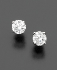 Make a chic style statement with the classic elegance of round-cut diamond stud earrings (1/2 ct. t.w.) set in 14k white gold. Make a chic style statement with the classic elegance of round-cut diamond stud earrings (1/2 ct. t.w.) set in 14k white gold.