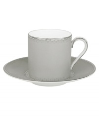 Enjoy a bold brew with this enormously stylish espresso cup and saucer set. From innovative designer Monique Lhullier, it features a platinum-edged tiered scallop pattern on creamy white. Enjoy a bold brew with this enormously stylish espresso cup and saucer set. From innovative designer Monique Lhullier, it features a platinum-edged tiered scallop pattern on creamy white.